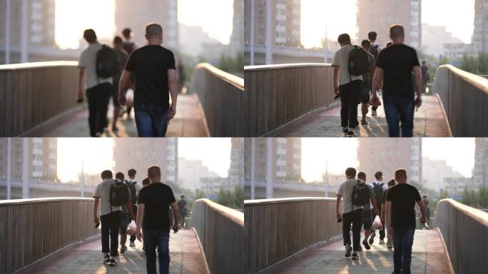 北京天桥行人背影脚步匆匆夕阳阳光实拍素材