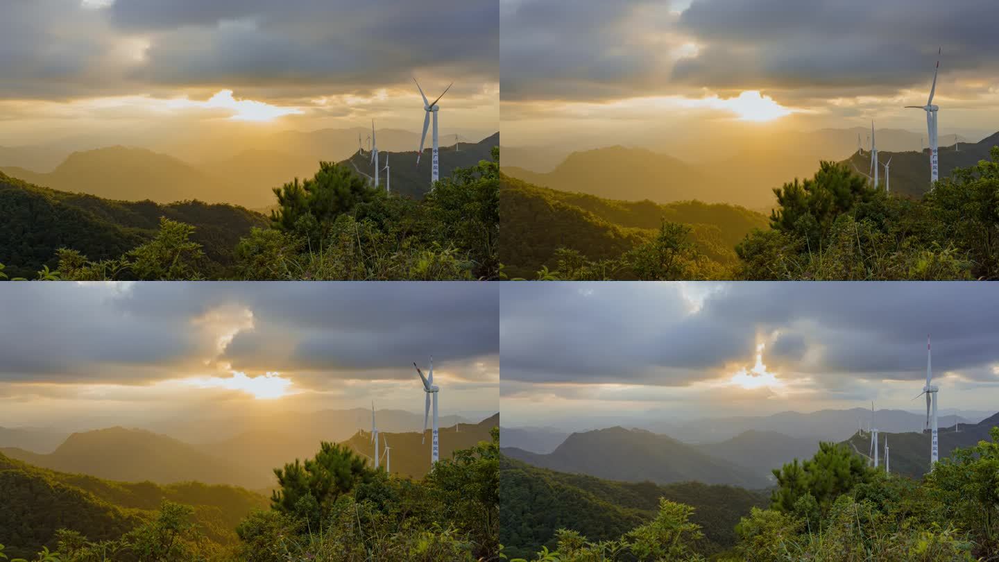 山顶日落有风车做前景