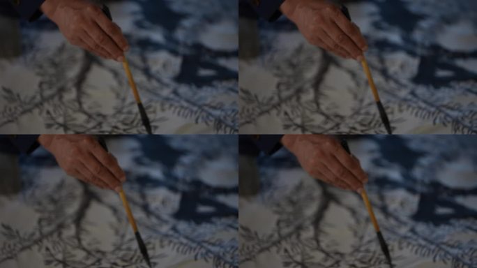 画家手拿毛笔画水墨中国画山水树实拍原素材