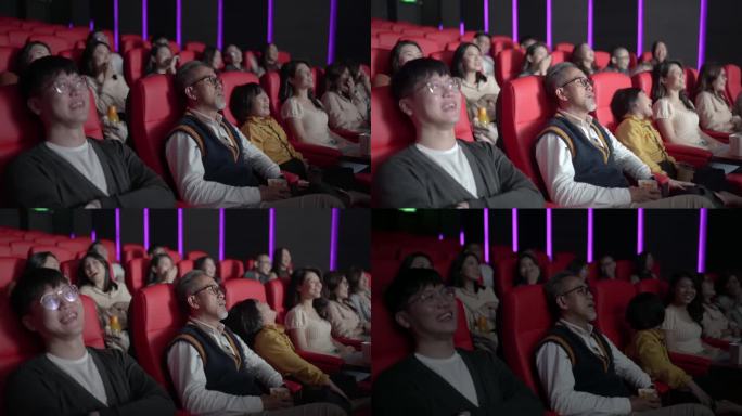 亚裔中国老人在电影院电影院疲劳衰老过程中与孙女一起看电影入睡