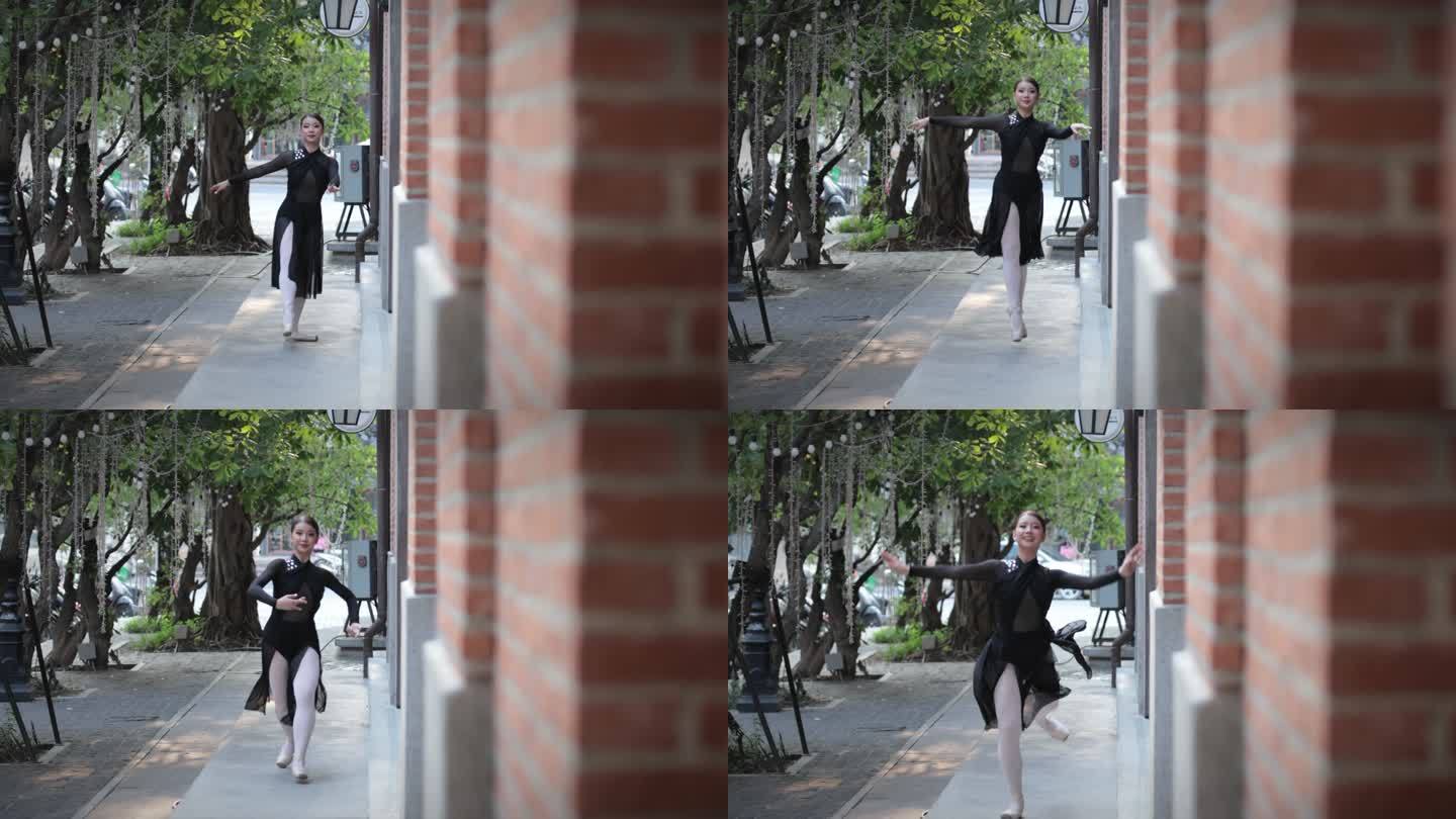 美丽的年轻芭蕾舞演员在城市的旧建筑旁奔跑和跳跃。慢动作。