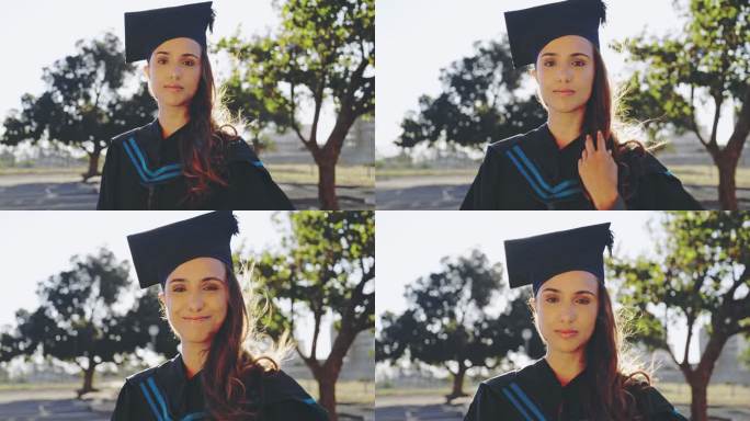 一个年轻的女学生在毕业那天站在大学校园外，看起来很开心。毕业生微笑着准备在校园典礼上接受毕业证书