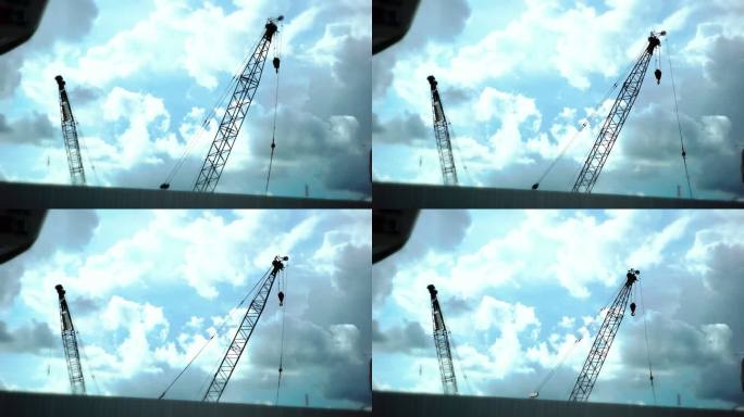 蓝天施工现场高空作业产业工人塔吊塔机