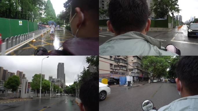 电动车雨天城市社区街道骑行后座视角