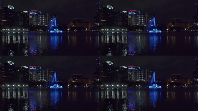 夜间，佛罗里达州奥兰多市中心埃拉湖上的照明喷泉