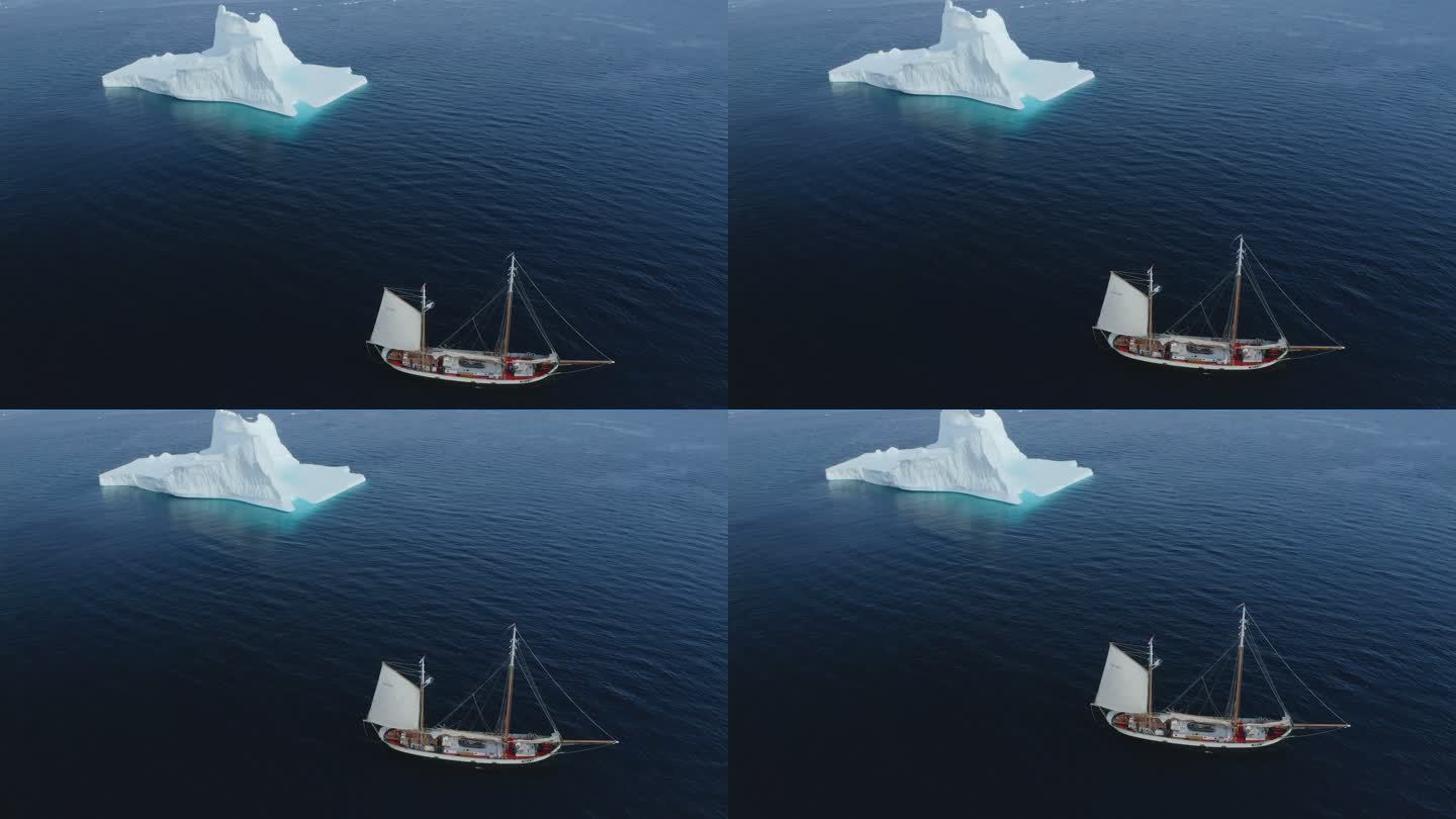 蓝色海洋格陵兰岛表面的船只和冰山