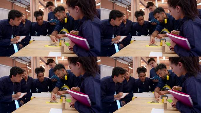 拉丁美洲男老师向他的学生解释如何在木工实验室工作，而他们都在专心致志