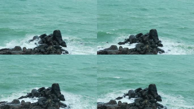 海浪冲击。礁石岩石