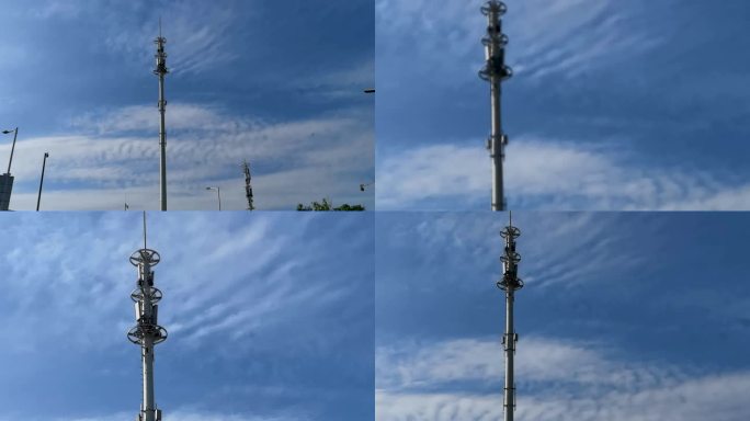 蓝天白云和公路上的信号塔