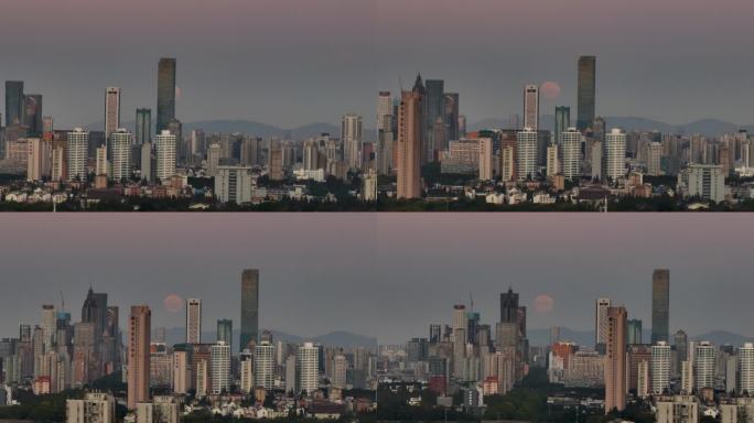 航拍日出时的月落南京城