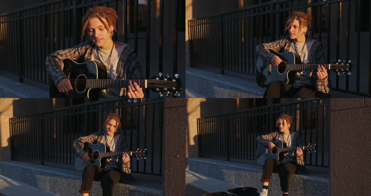 城市里弹吉他的年轻女子
