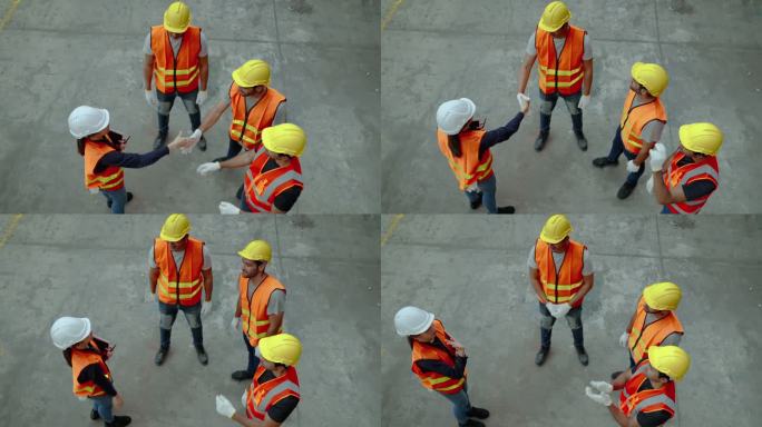 协作完成后，检查员或主管触摸工人的手。
