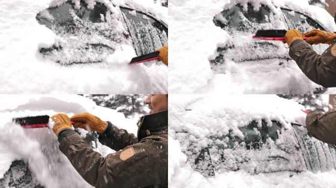 从汽车上刮雪的人铲雪下雪冬天冬季汽车