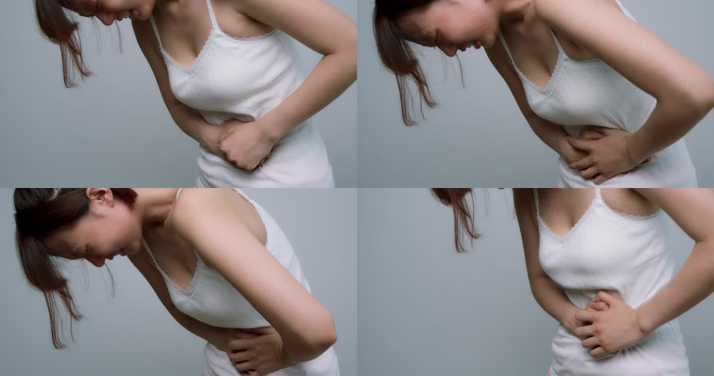 亚洲女性胃痛身体不舒服突发疾病心慌气短