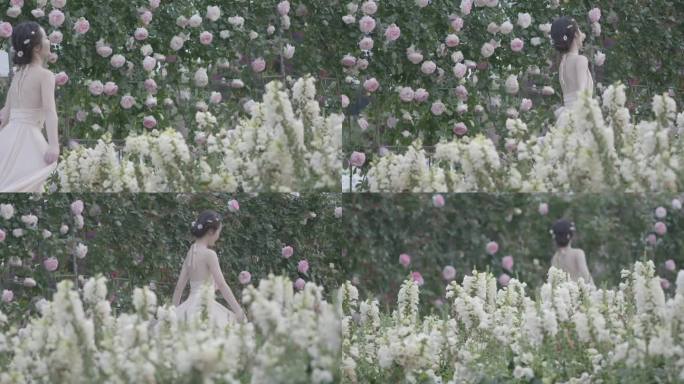 唯美美女在花海中行走触摸鲜花盛开闻花香