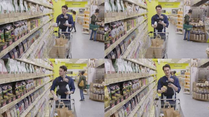 父亲带着孩子和智能手机在超市购物