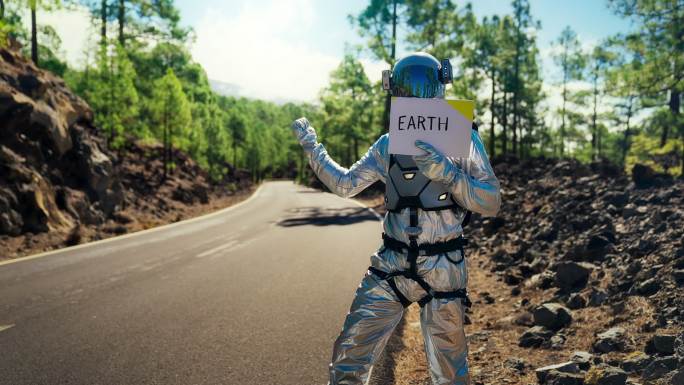 宇航员正在寻找返回地球的机会。在山路上搭便车