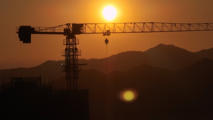 城市建设城市发展工地延时夕阳剪影塔吊大气