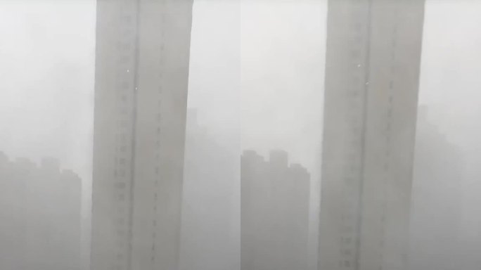 西安手机拍摄楼宇间大雨