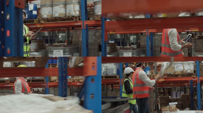 亚洲仓库工人男女在仓库使用数字平板电脑与白色安全帽进行讨论。仓库员工在配送仓库检查库存。