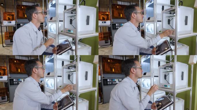 拉丁美洲设计师在一家创意办公室工作，看着3D打印机打印出一个物体，并将设计放在平板电脑上