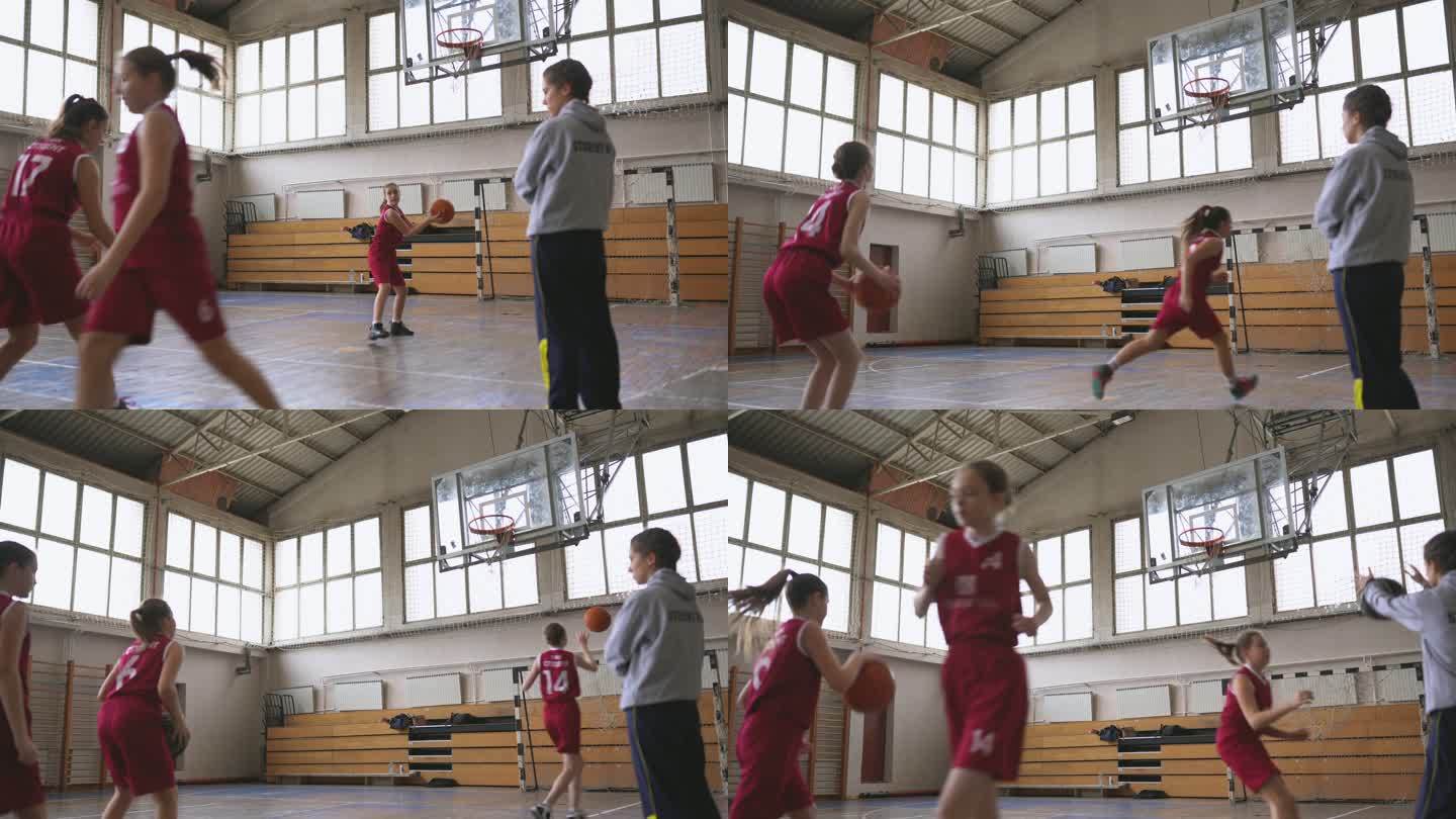 篮球教练观看女生罚球练习