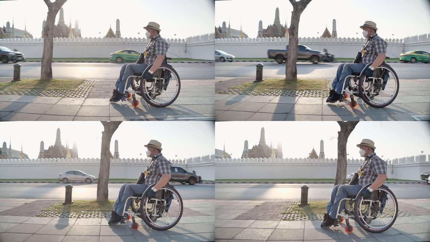 曼谷概念轮椅旅游地标。残疾人过街，轮椅在城市人行道上