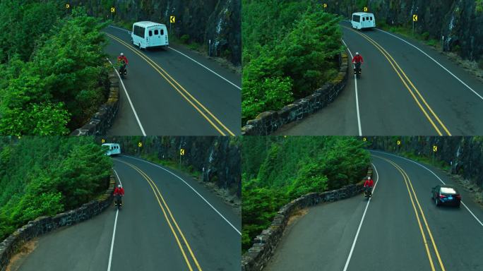 俄勒冈州海岸公路上的公共汽车经过骑自行车的人