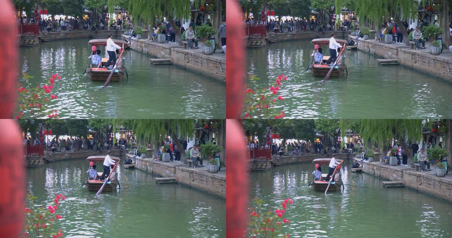 8K实拍古镇人流意境背影水中划桨游客玩耍