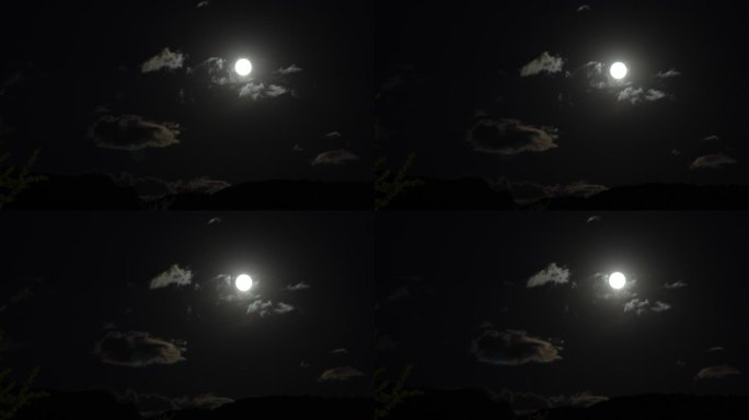 夜晚云层飘过月亮