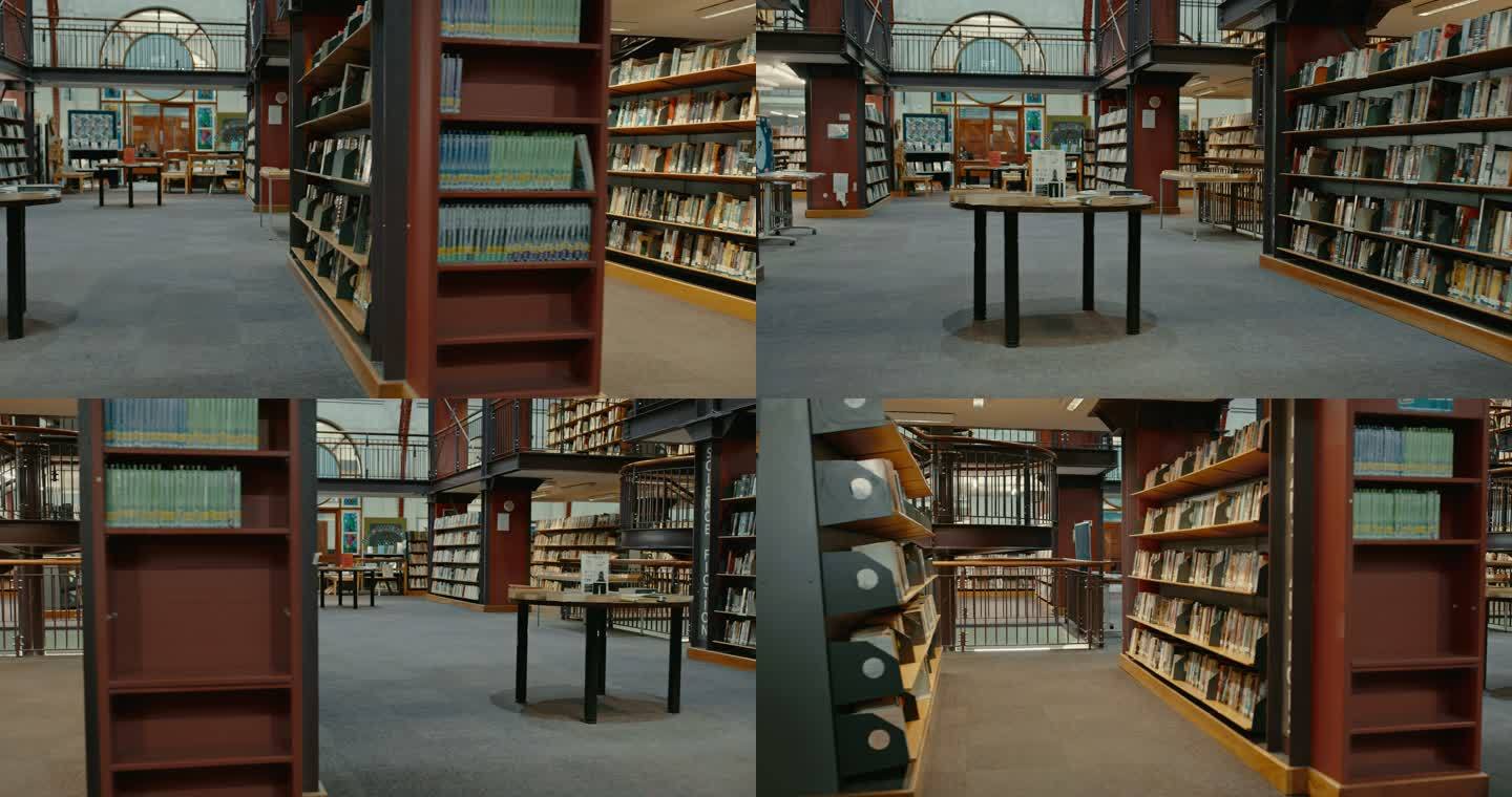 图书馆里一排排整齐的书架。安静空荡荡的图书馆里有各种各样的书。