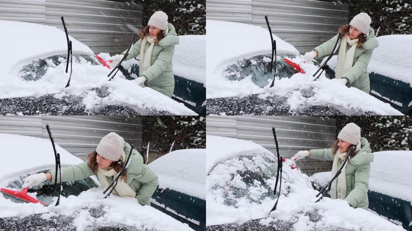 一位年轻女子正在清理汽车上的积雪