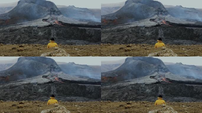 游客欣赏冰岛新火山爆发的风景