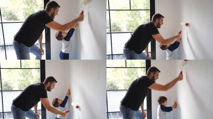 父子俩粉刷墙壁家居工作工具滚动