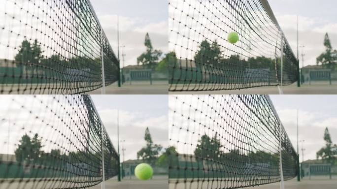 室外网球场上一个球触网的4k视频片段