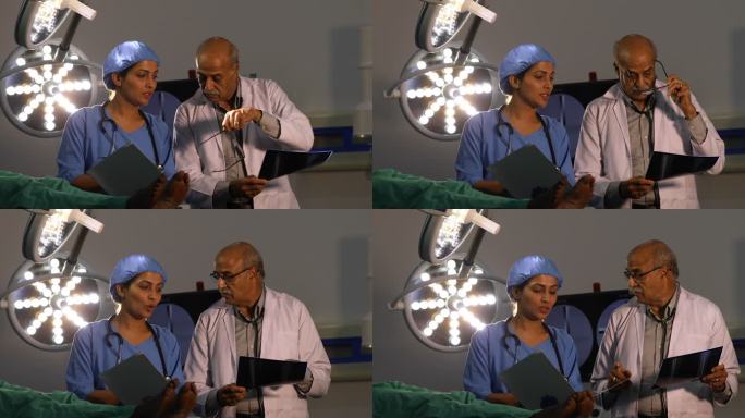 医生和护士在手术室对患者进行x光检查