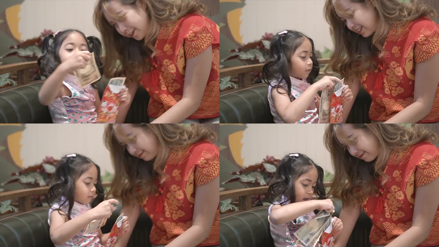 母亲在春节庆典上给女儿红包