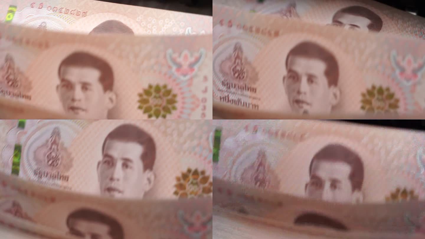 泰国钞票1000泰铢（1,00泰铢）在钞票柜台机器中计数的慢动作特写镜头，货币，计数，银行柜台，机器