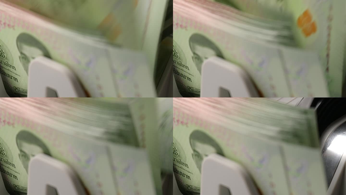 泰国银行纸币20泰铢在银行纸币计数器中计数的慢动作特写镜头，货币，计数，银行计数器，机器，纸币，金融