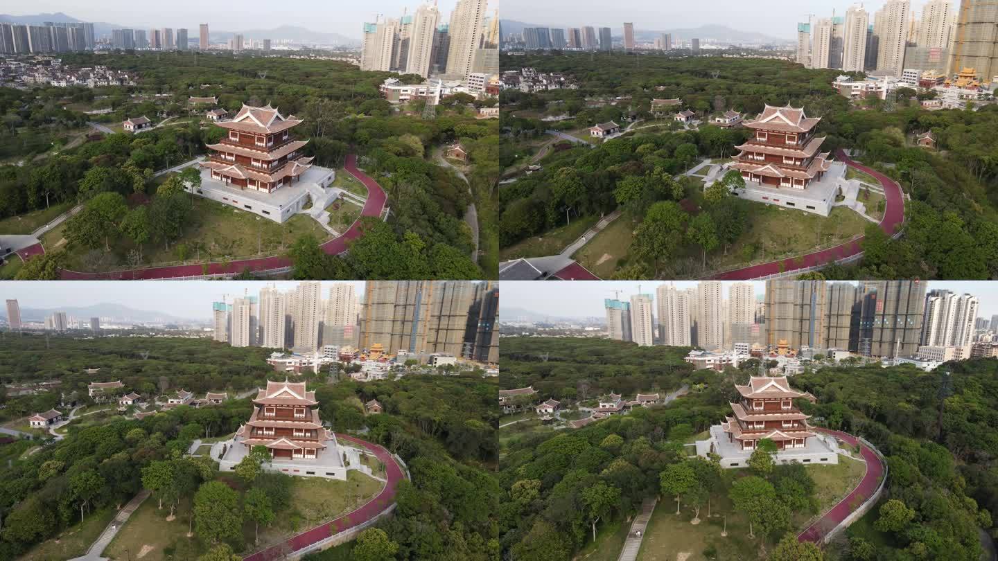 一个森林覆盖的城市公园中的中国传统阁楼的空中视频