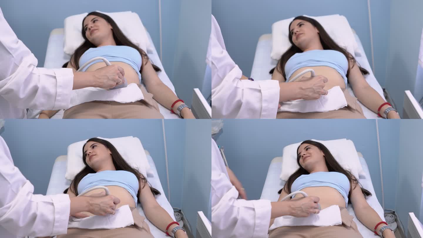 医生在医院用超声波机检查年轻女性患者的腹部