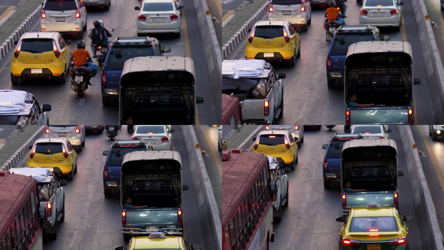 周五傍晚，在泰国交通堵塞的道路上，汽车、卡车、摩托车、公共汽车。