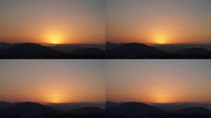 群山日落延时唯美夕阳黄昏橙色天空太阳下山