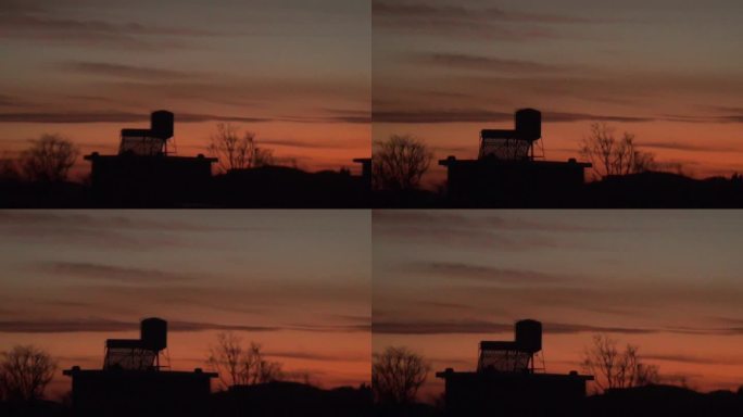 太阳落山日暮降临天空染成橘红色
