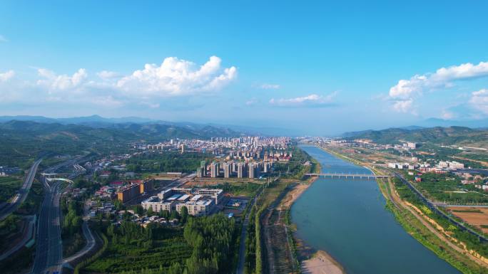 卢氏县城夏季航拍蓝天白云洛河