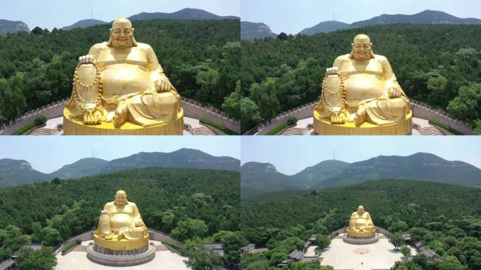 游客广场拉远弥勒佛雕像4k航拍