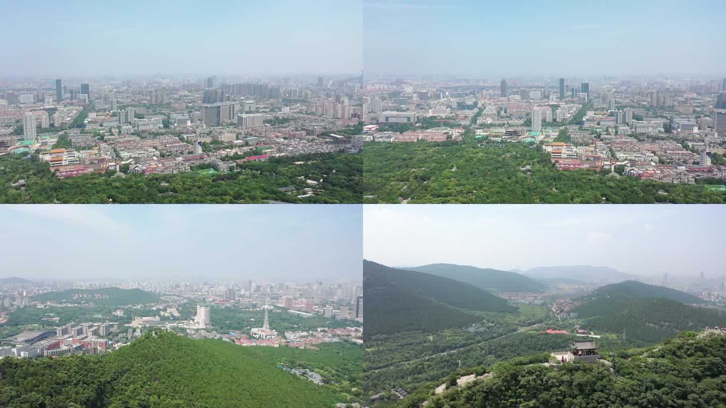 山顶俯瞰城市建筑群风景4k航拍