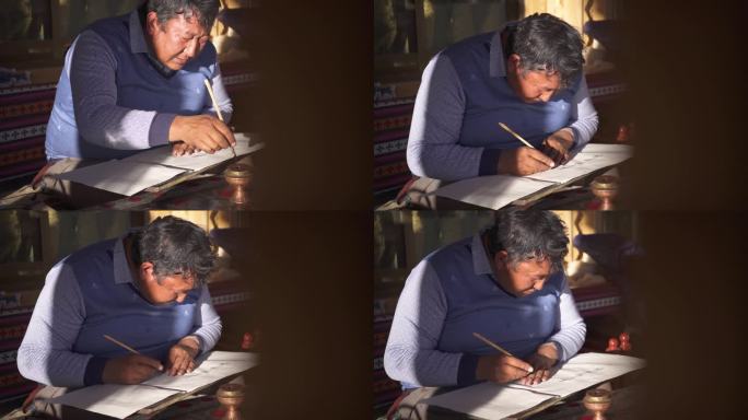 大叔在写字 男人在写字 藏族男人在写字