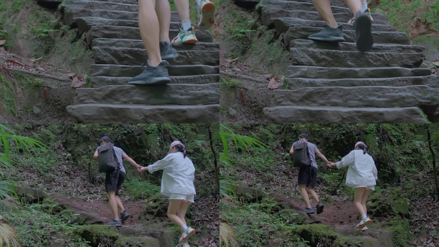 情侣牵手登山石阶脚步