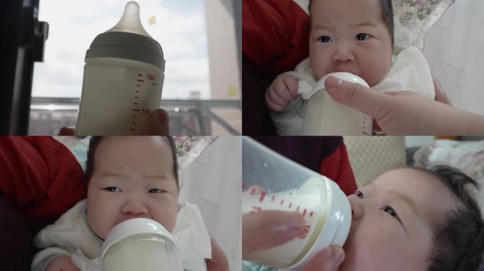 摇奶喂奶婴儿喝牛奶